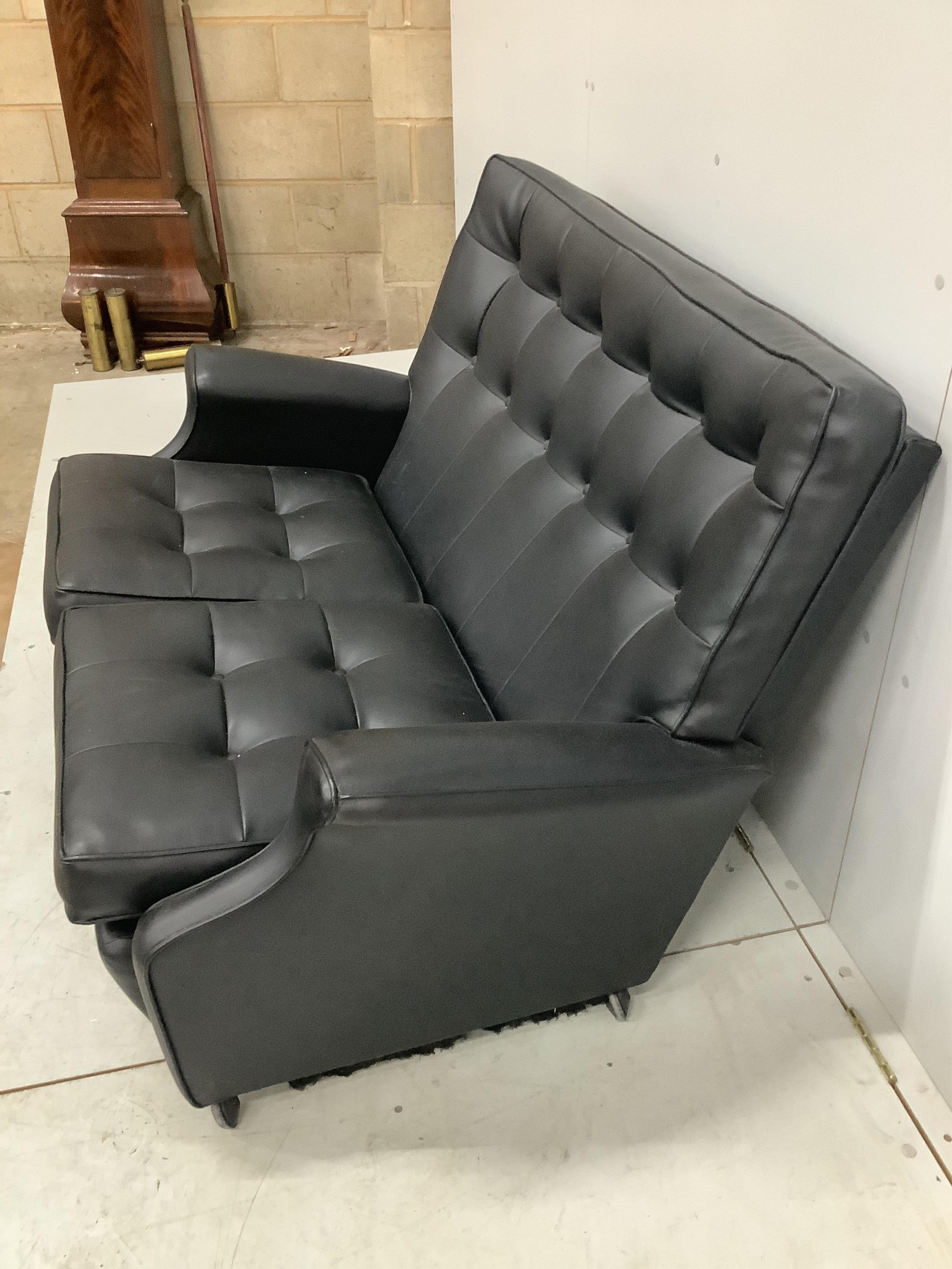 A 1960's leatherette two seater settee, width 130cm, depth 70cm, height 83cm. Condition - fair to good